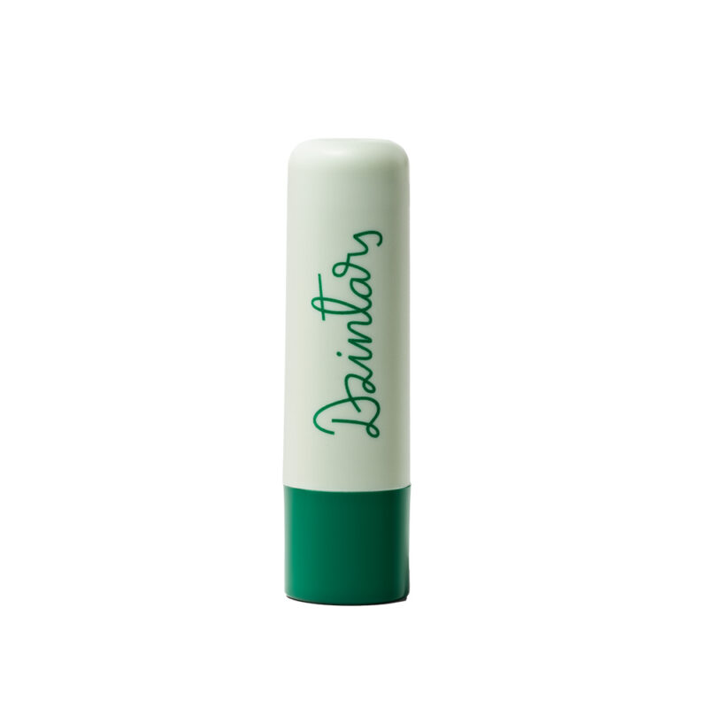 Dzintars Dubulti Protective Lip Balm stick – mint green tube with dark teal base and Dzintars script logo, white background