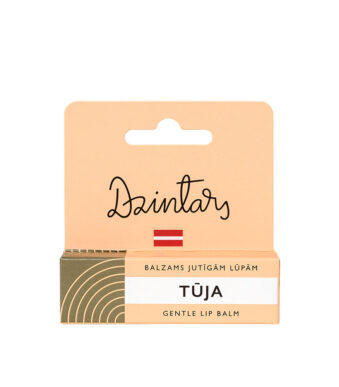 Dzintars Tūja Gentle Lip Balm for sensitive lips – peach packaging with hang tab, made in Latvia