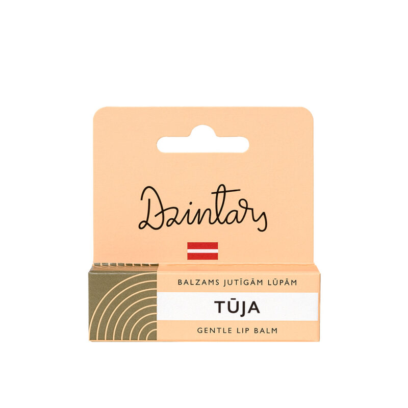 Dzintars Tūja Gentle Lip Balm for sensitive lips – peach packaging with hang tab, made in Latvia