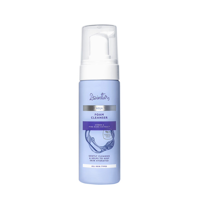Dzintars Roja Foam Cleanser in a light blue pump bottle with amber and pine bark extract, 96% natural-origin ingredients