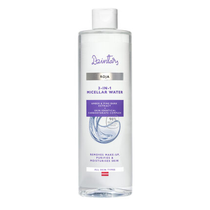 Dzintars Roja 3-in-1 Micellar Water in a large clear bottle with purple label, amber and pine bark extract formula