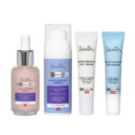 Dzintars Roja four-piece moisturising set with serum, face cream, eye cream, and eye serum on white background