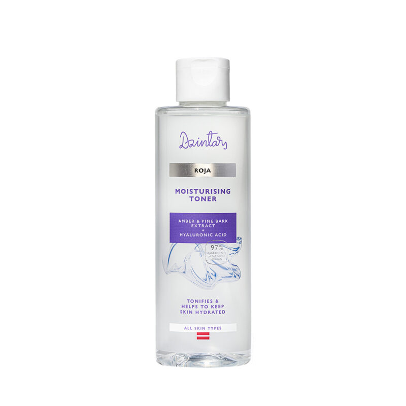 Dzintars Roja Moisturising Toner in a clear bottle with purple label, amber and pine bark extract with hyaluronic acid